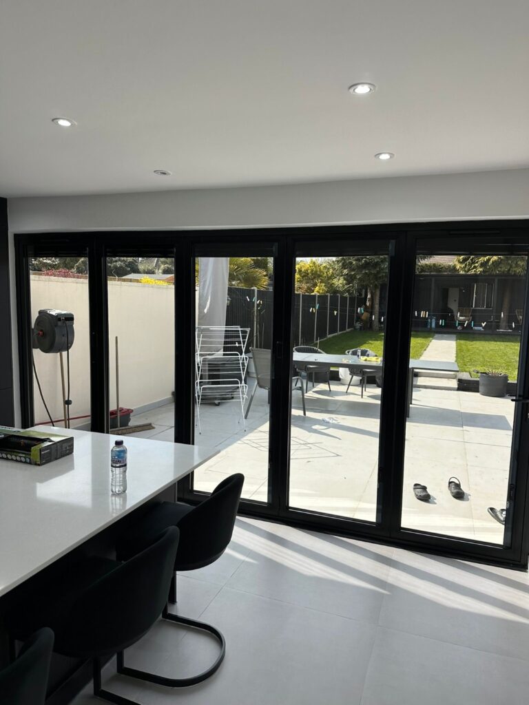 S-Line Solarfilm team installing window film in Epsom residence