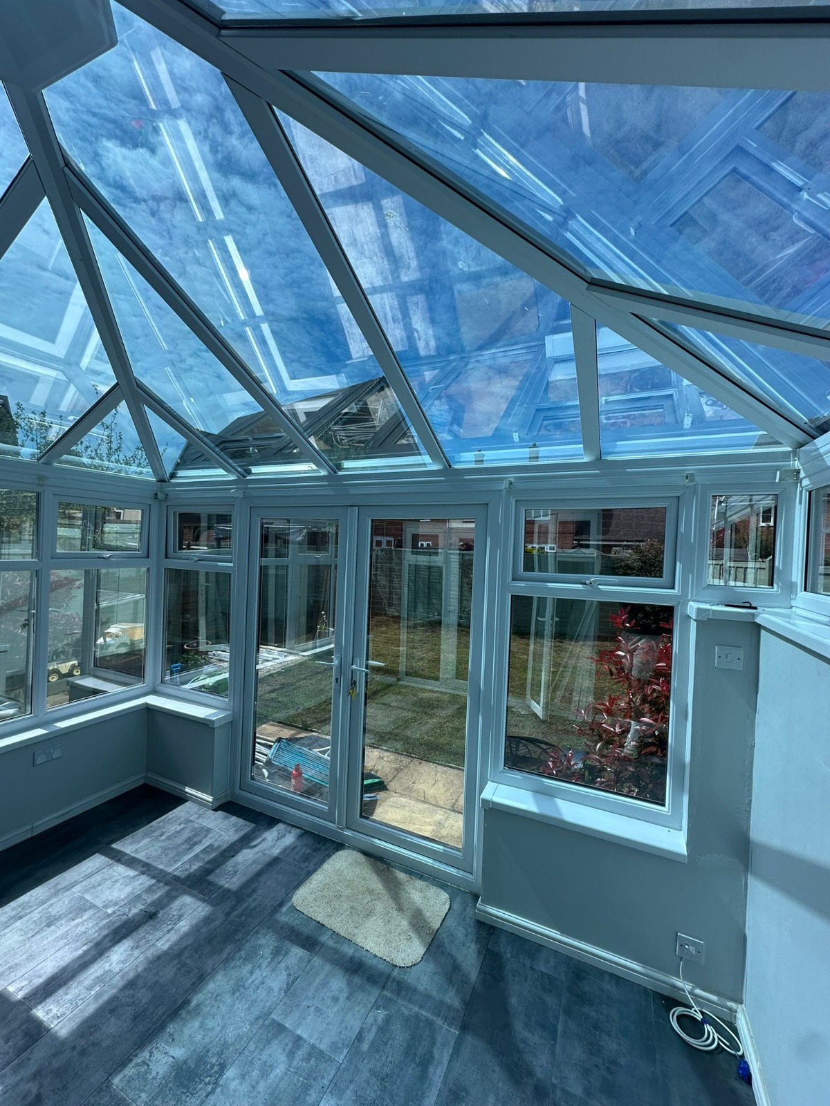 Epsom living room with reduced heat from solar window film