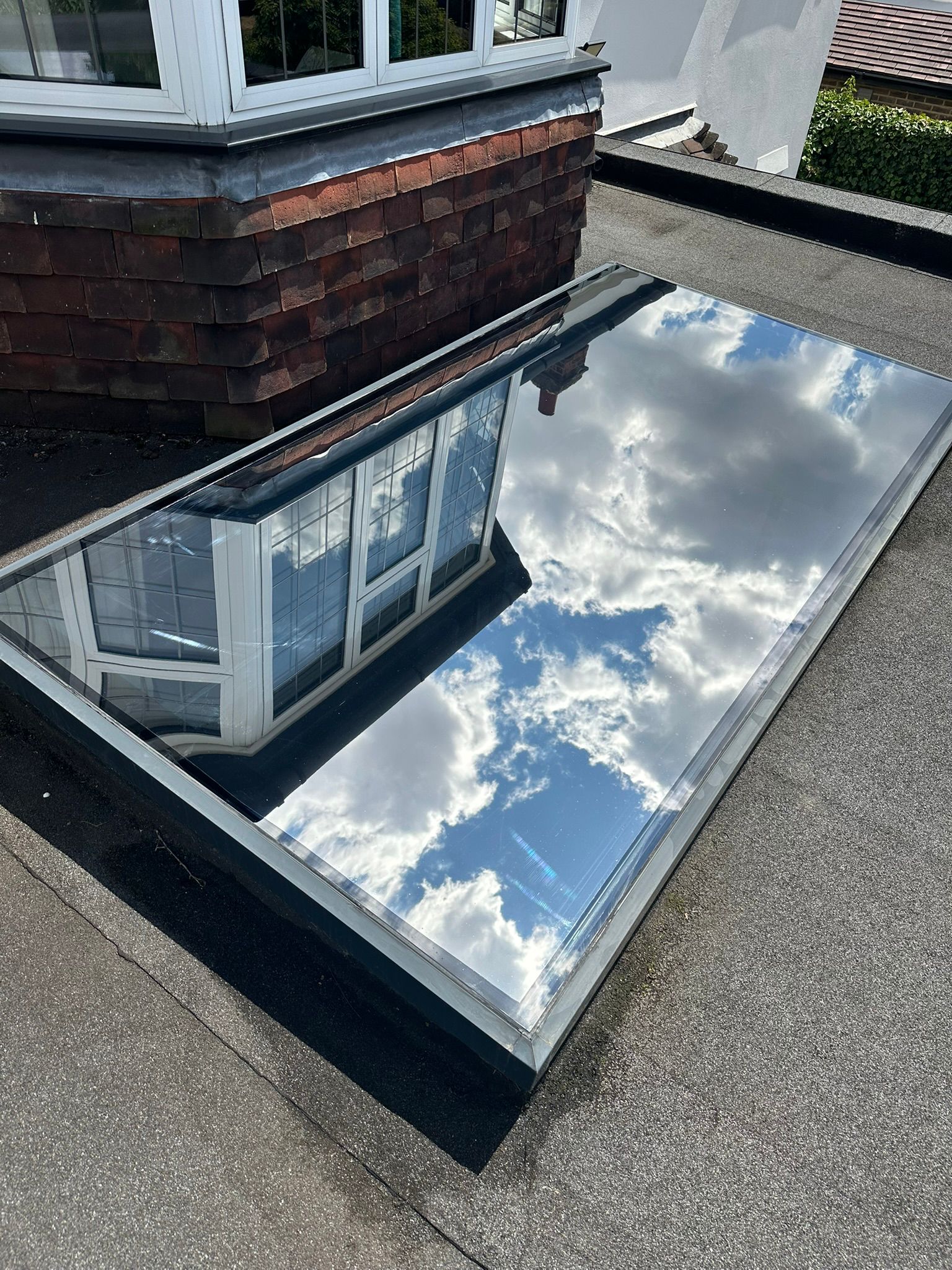 Solar window film installation for reducing glare in Bournemouth homes.