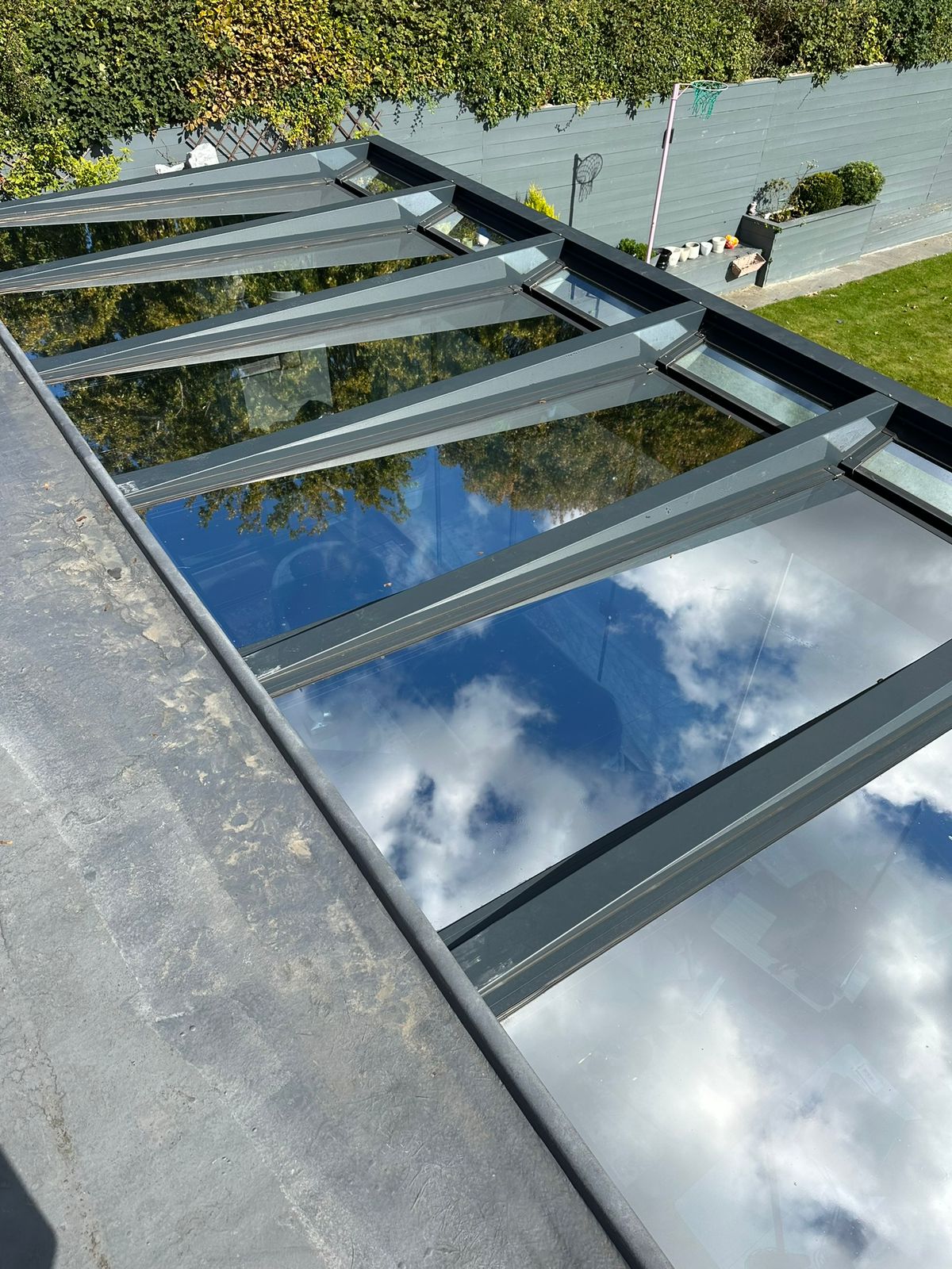 Before and after residential window film installation in Surrey